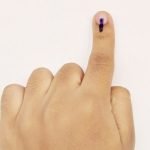 Representative image of a voter showing indelible ink on a finger